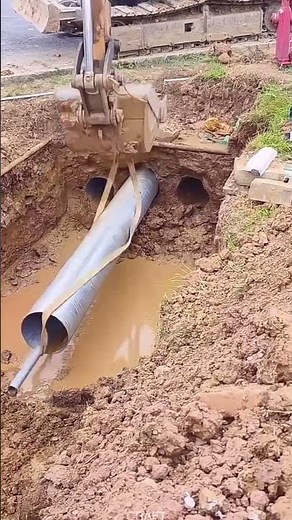 Efficient Demo: Excavator-Assisted Drain Pipe Installation