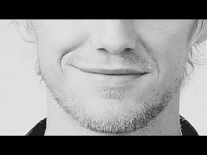 how to smile naturally without showing teeth