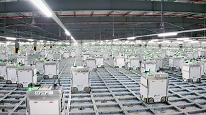 Inside Ocado’s secret warehouse where army of 2,000 robots pick up to 2MILLION food items a day...