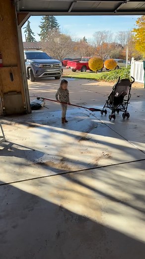Had a helper this weekend to do some chores before winter! It may have taken us twice as long but we got the shop swept out! | Tage Belnap