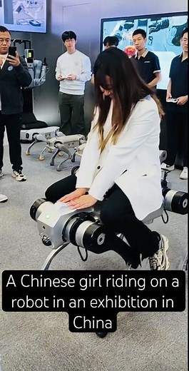 Chinese Girl Rides a Real Robot at Tech Exhibition in China!
