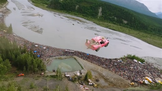Watch this car fly off a cliff into a huge crowd of people