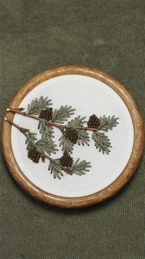 Evergreen branches and pine cone embroidery #shorts #threadart #winterholiday