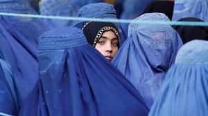 Taliban declare 'amnesty' across Afghanistan, urge women to join government, as evacuation flights from Kabul resume