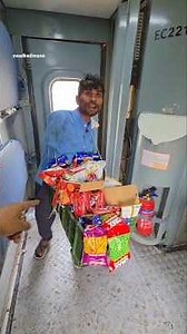 A disabled vendor in the train, without one hand, sells chips and water by carrying a weight of 2...