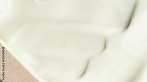 Cosmetic texture of anti-cellulite cream for body, macro shot, rotation. Skin cream texture, closeup beauty facial cosmetics mask