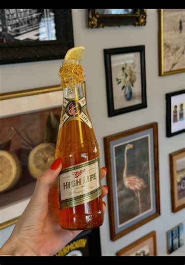 SUPER BOWL COCKTAILS - Spagetts 🍊🍋🍺 (recipe is per bottle) •dip top of bottle into simple syrup then a mixture of dried lemon zest and tajin •open the bottle and pour out about 1-2 oz of Miller High Life from the bottle •add 3/4 oz aperol •add 1/2 oz freshly squeezed lemon juice •garnish with small lemon wedge enjoy!!!! #superbowlsunday #superbowlparty #superbowlcocktails #spagett #millerhighlife