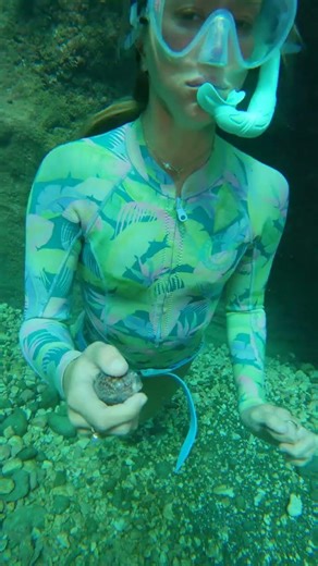 mermaid girl finds two amazing shells in the coral rubble pile. this is why she always checks, she