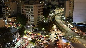 Download night traffic movement in traffic jam of cars and buses in urban city in timelapse