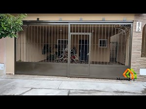 Fabricación de portones dos hojas corredizas automatizadas con motor Master Door