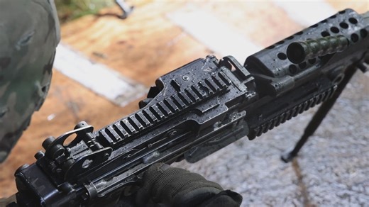 B-Roll: Soldiers train with M249 light machine gun in preparation for E2B