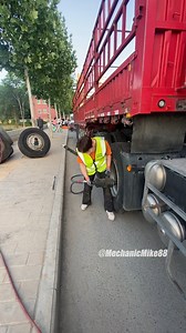 Real Strength: Lady Replaces 8 Truck Tires on the Spot! #TireChange #HardworkingWoman #StrongWoman #TruckRepair #MechanicLife #RoadsideRepair #WomenInTrades #RespectTheHustle #HeavyDutyWork #MechanicZhang #GirlPower #TruckMaintenance #TireReplacement #WorkshopLife #HandsOnWork | Mechanic Mike