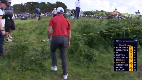 Rory McIlroy hits two balls in one shot during wild third round at The Open