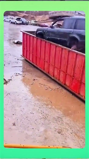 Loading scrap cars into a container for transport and recycling. 🚗 #recycling #heavymachine #shorts