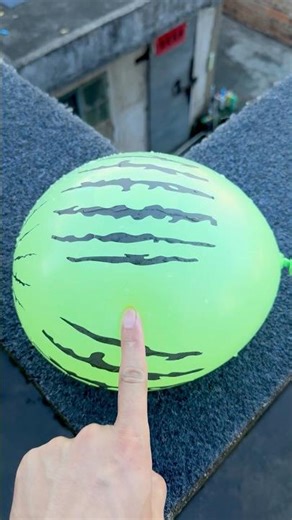 Experiment: Will a water balloon explode if it rolls down from a tall building? 💥🎈 #balloon