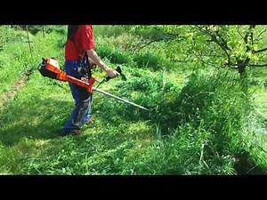 Dolmar MS with unsharped 3 tooth blade in very dense grass