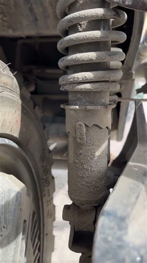 Detailed Look At A Broken Shock Absorber Shell On Motorcycle