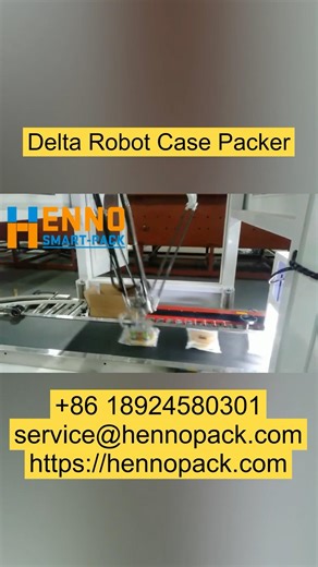 Delta robot case packer. Packing small bagged cakes into boxes.￼￼ #machine #packing #factory #case