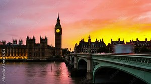 London, UK. Sunset over the city of London, UK. Colorful sky behind Westminster and Big Ben. Westminster bridge at night. Time-lapse at sunset