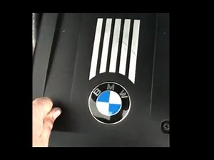 How to Remove BMW engine cover. Here on 530i 2007 6 cylinder motor plastic shield