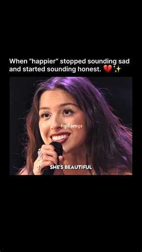 Songs | Music | Lyrics on Instagram: "Some songs don’t get louder live — they get closer. 💔🎙️ When Olivia Rodrigo performed “happier” during the GUTS World Tour, the song didn’t feel bigger… it felt more exposed. A massive arena, thousands watching — yet somehow, it sounded like a private confession said out loud. There were no distractions. No theatrics. Just her voice, the lyrics, and that quiet tension that only heartbreak songs carry when they’re sung honestly. Every line landed heavier, e