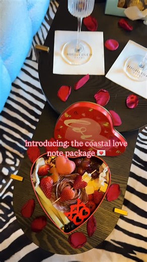 @thehighlinerhotel on Instagram: "A love note written by the sea. 🌊💌 Our Coastal Love Note Package turns your Valentine’s stay into something truly special - champagne chilled, rose petals scattered, artisan chocolates, and a sweetheart charcuterie board by @boardsfordays_ made for sharing. Book your coastal Valentine’s escape before 2/12 and let the ocean set the mood. ✨🥂 #gloucester #gloucesterma #newengland #massachusetts #valentinesday"