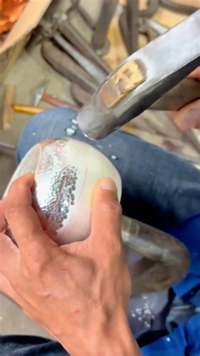 Carefully Shaping a Metal Sheet by Hand Hammering Over a Rounded Form #shorts