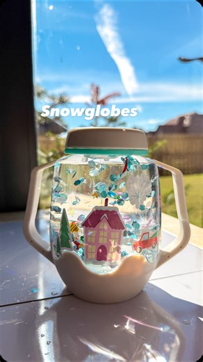 Chloe Duffy | Create Like Chloe on Instagram: "FOLLOW me and comment SNOW for the link! ❄️ This is such a fun winter activity you can surprise your kids with! My kids love the @glopals sensory jars, but turning them into snowglobes was such a neat twist! Each set comes with two boxes of festive mix-ins and even baggies to save any excess you don’t use on the first creation! My kids especially enjoyed adding the window cling stickers to their snowglobes because they can easily switch out the scen