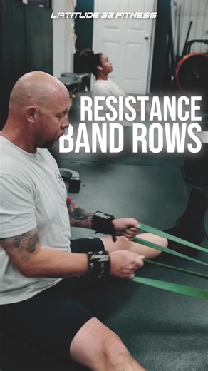 Band seated row Start tall with the arms straight Shoulders down and away from the ears Set the shoulder blades first by pulling them back Then row the band to the rib cage Elbows stay close Control the return and keep tension the whole time #back #strength #gym #coach #trainer