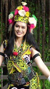 A Borneo lady showcasing the beauty of her culture through her stunning traditional clothing