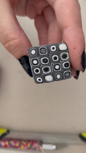 Extruder Cane! So simple and so effective. Just whack your polymer clay colours into the extruder (you don’t have to do them all neat and even like I did) and wind it out! The extruder will create magic for you and all you have to do is tile it together! I used Premo black, white and white gold glitter. How good does it look! . . #extruder #pllymerclay #polymerclaycane #earringmaker #contemporypolymerclay #claylife #craftersgonnacraft #craftersofinstagram #makersmovement #makersgonnamake #scrapc