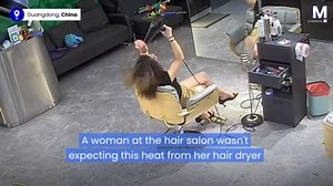 Woman's hair drying session interrupted by an explosion