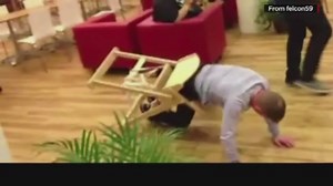 VIDEO: Grown man tries to free himself from high chair