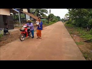 Rural life in Isan, Thailand. Morning ride around the village.