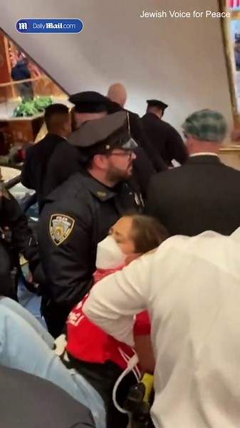 Protesters carried out of Trump Tower during Mahmoud Khalil protest
