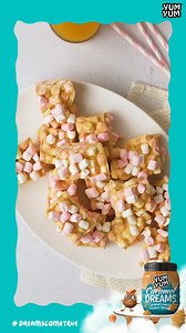 Looking for a yummy, kid-friendly recipe? Try out these delicious, 4 ingredient, YUM YUM Caramel Dreams squares. They are the perfect holiday treat, for the whole family to enjoy! What you’ll need: ¾ tub (239g) YUM YUM Caramel Dreams Crunchy Peanut Spread 2 slabs (150g each) white chocolate, roughly chopped ½ cup (113g) butter 4 cups pink & white mini marshmallows, plus extra for decorating. Steps: Line a 23cm square baking dish with baking paper and lightly grease. Add YUM YUM Caramel Dreams Cr