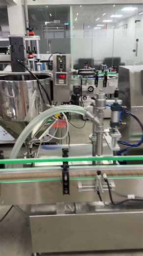 automatic bottle feeding filling capping and labeling bottling line #bottlefilling #machine #fyp