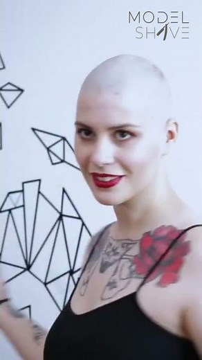 Brunette bowl cut and complete headshave.