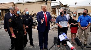 Trump visits burned building in Kenosha, Wisconsin, says it could have been prevented