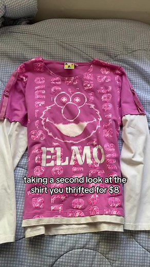 leave me & my sesame street pink elmo shirt alone 😞