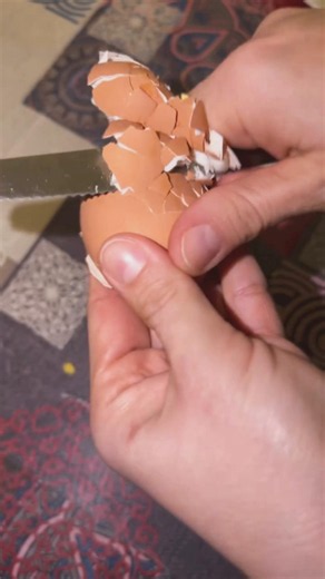 how do you open a boiled egg huh??