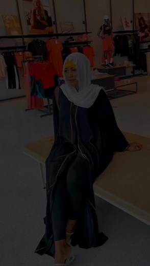 Stylish Outfit Showcase in Retail Store