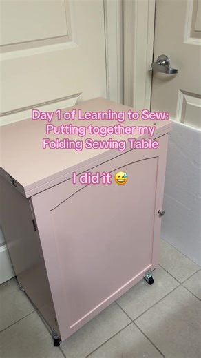In 2026 we’re learning how to sew! Day 1: putting together my folding sewing table. After a few hours, I did it. 😅 #foldingsewingtable #sewingtable #sewingbeginner #pinkgirl #learningtosew