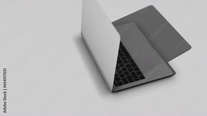 A 3d animated laptop computer with bluish code on the screen opens and a “Hardware” key is pressed