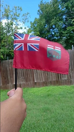 Flag of Manitoba waving in the wind