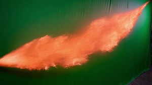 Download Fiery spray emitting on green screen background for free