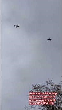 HELICOPTERS FLOCK OF HELICOPTERS IN FORMATION.