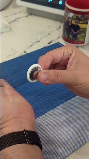 open your Apple AirTag to replace battery...