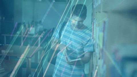 clip-3977343639-library-reader-flipping-pages-under-soft-lights