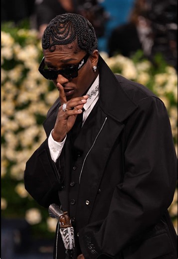 The #MetGala2026 is in a few hours, so let's take a look back at A$AP Rocky shutting down last year’s carpet in a look only he could pull off. A classic Rocky with layers of black tailoring, iced out details, sharp braids, dark shades. What fashion moment do you think we're getting from him tonight?